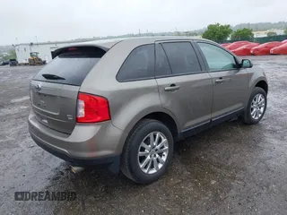 2014 Ford Edge SEL z VIN 2FMDK4JC0EBA36381, wystawiony jako IAAI lot #42236973 z przebiegiem 146 053 mil mil oraz . Historia ofert i sprzedaży dostępna na DreamBid. Obrazek 4.