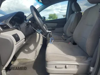 2015 Honda Odyssey LX with VIN 5FNRL5H27FB018491, listed as a Copart auction lot 54888445 with 129,488 mi miles and Salvage Title. Bid and sale history available at DreamBid. Image 7.