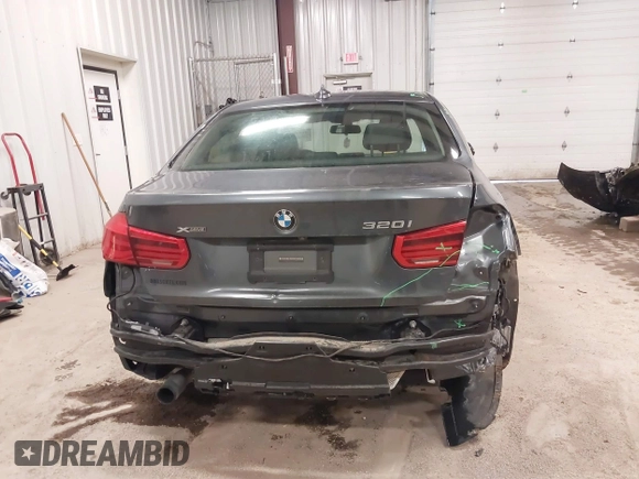 2018 BMW 3 Series 320i xDrive with VIN WBA8E5G50JNU48047, listed as a IAAI auction lot 41564022 with 69,971 mi miles. Bid and sale history available at carsss.com. Image 16.