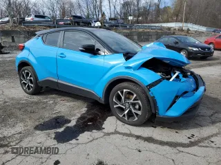 2019 Toyota C-HR XLE with VIN NMTKHMBX4KR097964, listed as a Copart auction lot 50431145 with 0 mi miles and Salvage Title. Bid and sale history available at carsss.com. Image 4.