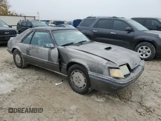 1986 Ford Mustang with VIN 1FABP28T8GF109009, listed as a Copart auction lot 83148544 with 329,005 mi miles and Salvage title. Bid and sale history available at DreamBid. Image 4.