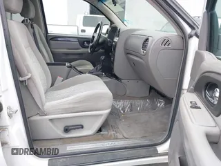 2005 GMC Envoy SLE z VIN 1GKDT13S652279384, wystawiony jako IAAI lot #42208597 z przebiegiem 147 036 mil mil oraz . Historia ofert i sprzedaży dostępna na DreamBid. Obrazek 5.