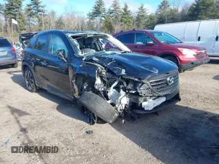 2016 Mazda CX-5 Grand Touring with VIN JM3KE4DY4G0909782, listed as a IAAI auction lot 41006111 with 30,135 mi miles. Bid and sale history available at carsss.com. Image 1.