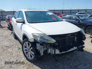 2013 Mazda CX-9 Grand Touring with VIN JM3TB2DA3D0403697, listed as a IAAI auction lot 41976262 with 127,117 mi miles and . Bid and sale history available at DreamBid. Image 1.