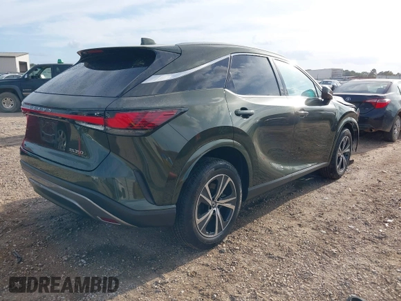 2023 Lexus RX with VIN 2T2BAMBA1PC018330, listed as a IAAI auction lot 40710320 with 17,885 mi miles. Bid and sale history available at carsss.com. Image 4.