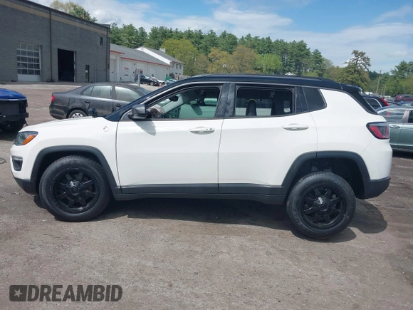 2020 Jeep Compass Trailhawk with VIN 3C4NJDDBXLT189303, listed as a IAAI auction lot 42215585 with 51,453 mi miles and . Bid and sale history available at DreamBid. Image 14.