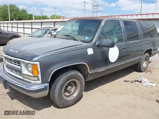 1999 Chevrolet Suburban with VIN 1GNEC16R9XJ502770, listed as a IAAI auction lot 42000467 with 245,844 mi miles. Bid and sale history available at carsss.com. Image 2.