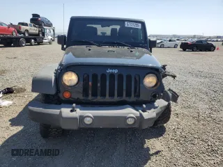 2012 Jeep Wrangler Sport z VIN 1C4AJWAG9CL257841, wystawiony jako Copart lot #57731255 z przebiegiem 112 614 mil mil oraz Szkoda całkowita • Salvage title. Historia ofert i sprzedaży dostępna na DreamBid. Obrazek 5.