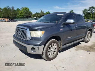 2010 Toyota Tundra 4WD Truck LTD with VIN 5TFHW5F16AX118545, listed as a Copart auction lot 61446264 with 199,936 mi miles and Salvage Title. Bid and sale history available at carsss.com. Image 1.