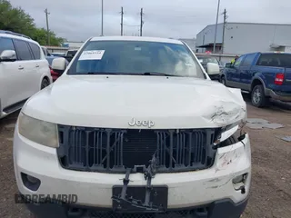 2012 Jeep Grand Cherokee Laredo with VIN 1C4RJFAG5CC224032, listed as a IAAI auction lot 42069334 with 106,614 mi miles. Bid and sale history available at carsss.com. Image 13.