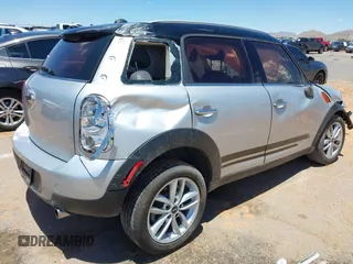 2014 MINI Countryman with VIN WMWZB3C53EWR40742, listed as a IAAI auction lot 42384059 with Not provided miles and . Bid and sale history available at DreamBid. Image 4.