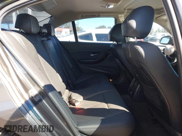 2015 BMW 3 Series 328i with VIN WBA3C1C51FK123852, listed as a IAAI auction lot 41857179 with 90,308 mi miles and . Bid and sale history available at carsss.com. Image 8.
