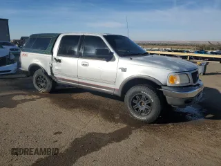 2002 Ford F-150 XLT with VIN 1FTRW08L12KA86849, listed as a Copart auction lot 77861574 with 0 mi miles and Salvage Title. Bid and sale history available at carsss.com. Image 4.
