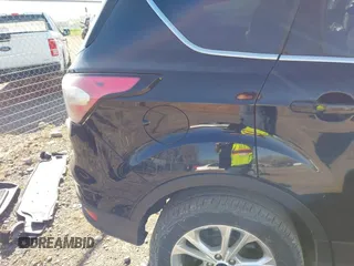 2018 Ford Escape SE z VIN 1FMCU9GD5JUB15259, wystawiony jako IAAI lot #42182040 z przebiegiem 122 194 mil mil oraz . Historia ofert i sprzedaży dostępna na DreamBid. Obrazek 22.