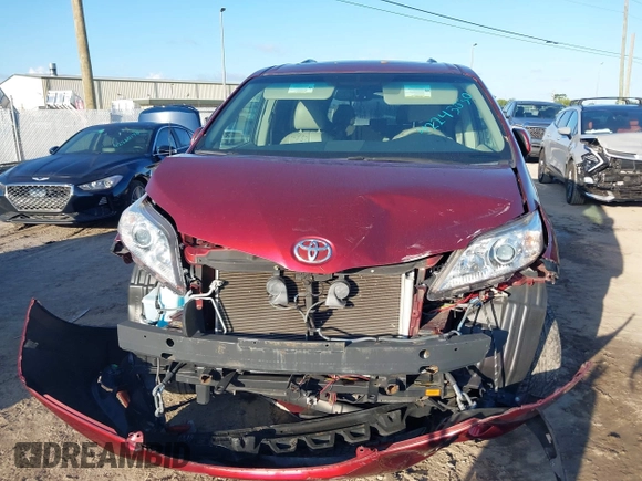 2014 Toyota Sienna XLE with VIN 5TDYK3DCXES473671, listed as a IAAI auction lot 42243030 with 70,052 mi miles and . Bid and sale history available at DreamBid. Image 12.