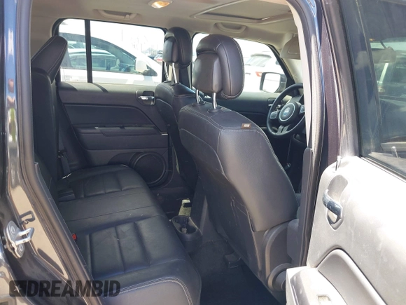 2014 Jeep Patriot Latitude with VIN 1C4NJPFA0ED848908, listed as a IAAI auction lot 41994006 with 131,122 mi miles and . Bid and sale history available at carsss.com. Image 8.