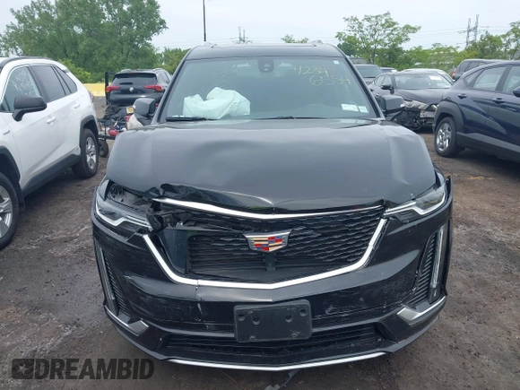 2024 Cadillac XT6 AWD Luxury z VIN 1GYKPBR49RZ723838, wystawiony jako IAAI lot #42346554 z przebiegiem 27 525 mil mil oraz . Historia ofert i sprzedaży dostępna na DreamBid. Obrazek 12.