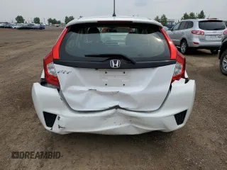 2016 Honda Fit LX with VIN JHMGK5H59GX004764, listed as a Copart auction lot 65131715 with 75,726 mi miles and Salvage title. Bid and sale history available at DreamBid. Image 6.