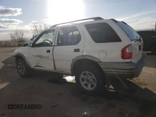2002 Isuzu Rodeo S with VIN 4S2CK58W324314240, listed as a Copart auction lot 43694015 with 132,212 mi miles and Salvage title. Bid and sale history available at DreamBid. Image 2.