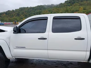 2014 Toyota Tacoma with VIN 3TMLU4EN9EM140999, listed as a IAAI auction lot 37765514 with 168,875 mi miles. Bid and sale history available at carsss.com. Image 14.