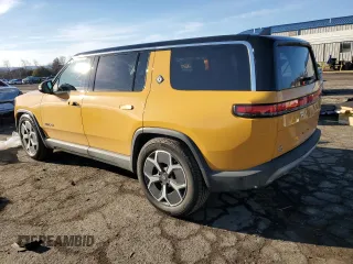 2023 Rivian R1S Adventure z VIN 7PDSGABA1PN009442, wystawiony jako Copart lot #45375605 z przebiegiem 28 047 mil mil oraz Szkody całkowita. Historia ofert i sprzedaży dostępna na DreamBid. Obrazek 2.
