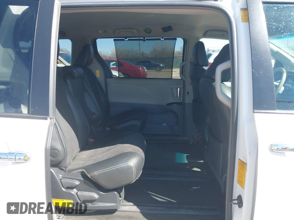 2014 Toyota Sienna SE with VIN 5TDXK3DC0ES477207, listed as a IAAI auction lot 41624619 with 213,881 mi miles and . Bid and sale history available at DreamBid. Image 8.