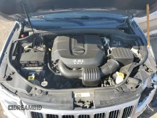2014 Jeep Grand Cherokee Limited z VIN 1C4RJFBG7EC204799, wystawiony jako Copart lot #62458805 z przebiegiem 126 966 mil mil oraz Szkoda całkowita • Salvage title. Historia ofert i sprzedaży dostępna na DreamBid. Obrazek 12.