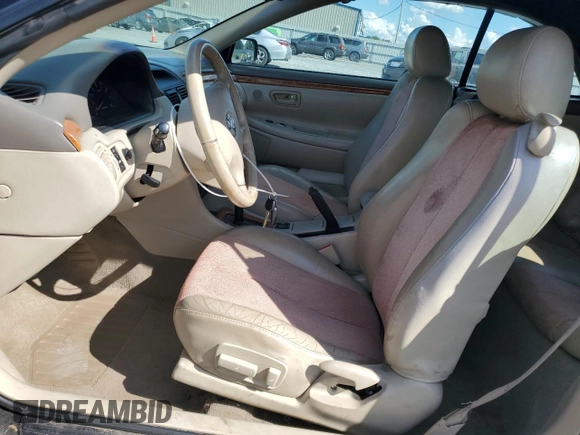 2002 Toyota Solara SE with VIN 2T1FF22P12C592550, listed as a Copart auction lot 74239934 with 221,988 mi miles and Salvage Title. Bid and sale history available at DreamBid. Image 7.
