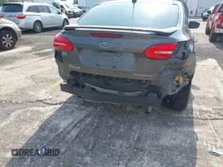 2018 Ford Focus Titanium с VIN 1FADP3J23JL272028, выставлен на аукционе IAAI как лот 42395402 с пробегом 125 975 миль миль и . История ставок и продаж доступна на DreamBid. Изображение 6.