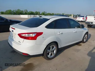 2014 Ford Focus SE with VIN 1FADP3F26EL163285, listed as a IAAI auction lot 42174124 with 172,016 mi miles and . Bid and sale history available at carsss.com. Image 4.