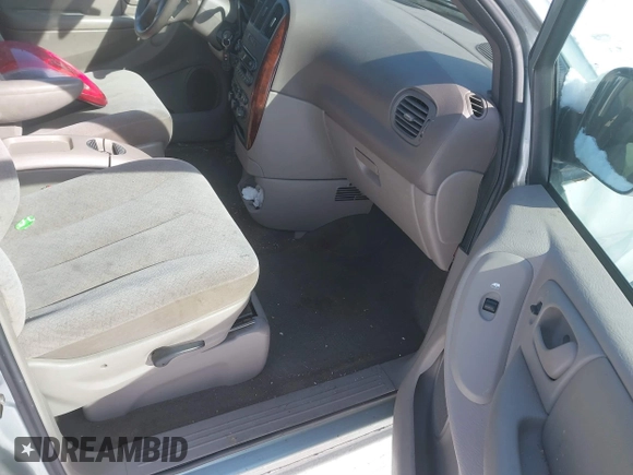 2003 Chrysler Town & Country LX with VIN 2C4GP44L43R224016, listed as a IAAI auction lot 41370108 with 122,418 mi miles and . Bid and sale history available at DreamBid. Image 5.