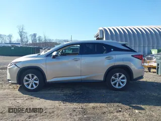 2016 Lexus RX 450h z VIN 2T2BGMCA7GC007006, wystawiony jako IAAI lot #41999343 z przebiegiem 124 912 mil mil oraz . Historia ofert i sprzedaży dostępna na DreamBid. Obrazek 14.