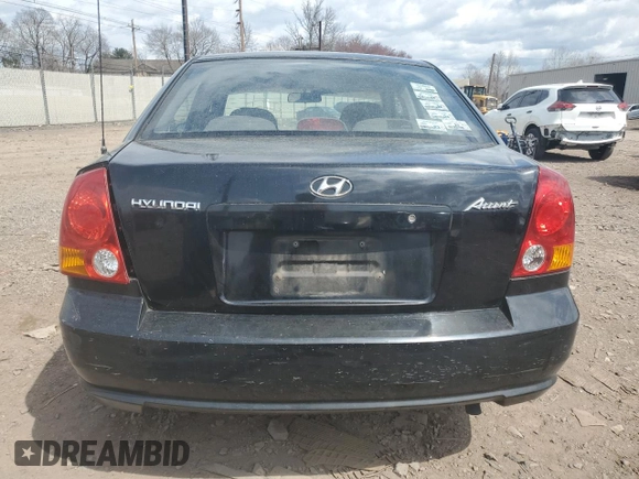 2004 Hyundai Accent GL with VIN KMHCG45C04U506196, listed as a Copart auction lot 51276195 with 75,550 mi miles and Clean Title. Bid and sale history available at carsss.com. Image 6.