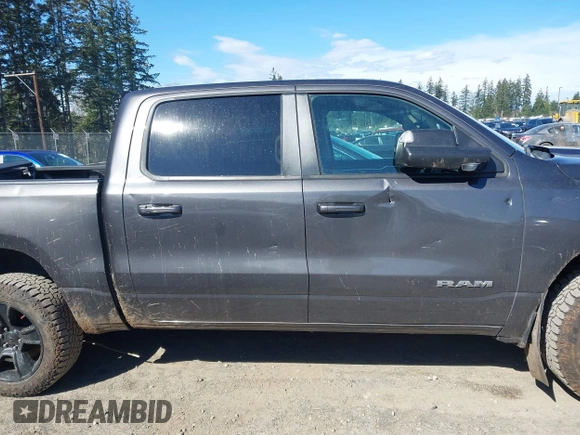 2019 Ram 1500 Big Horn/Lone Star with VIN 1C6SRFFTXKN681543, listed as a IAAI auction lot 41892943 with 86,105 mi miles. Bid and sale history available at carsss.com. Image 13.