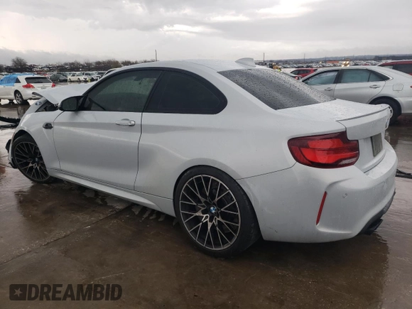 2020 BMW M2 Competition with VIN WBS2U7C01L7D66378, listed as a Copart auction lot 86432704 with 56,973 mi miles and Salvage Title. Bid and sale history available at carsss.com. Image 2.