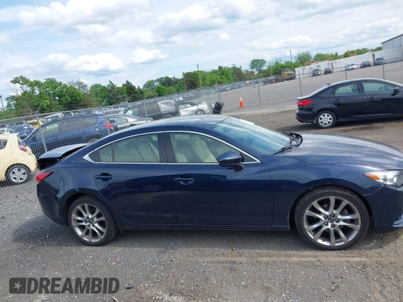 2015 Mazda 6 i Grand Touring with VIN JM1GJ1W53F1200121, listed as a IAAI auction lot 42173036 with 76,184 mi miles and . Bid and sale history available at DreamBid. Image 13.