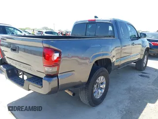 2020 Toyota Tacoma SR with VIN 3TYRX5GNXLT002488, listed as a IAAI auction lot 41973584 with 76,169 mi miles and . Bid and sale history available at DreamBid. Image 4.