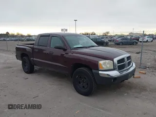 2005 Dodge Dakota SLT with VIN 1D7HW48N95S298672, listed as a IAAI auction lot 41765025 with 291,447 mi miles. Bid and sale history available at carsss.com. Image 1.