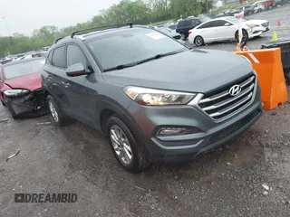 2018 Hyundai Tucson SEL with VIN KM8J3CA4XJU640429, listed as a IAAI auction lot 42063900 with 124,844 mi miles. Bid and sale history available at carsss.com. Image 1.