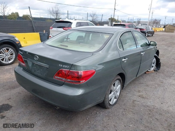 2006 Lexus ES 330 with VIN JTHBA30G265157365, listed as a IAAI auction lot 41573430 with 215,440 mi miles. Bid and sale history available at carsss.com. Image 4.