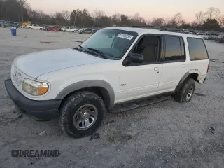 2000 Ford Explorer XLS z VIN 1FMZU72E9YZA98820, wystawiony jako Copart lot #87409634 z przebiegiem 190 297 mil mil oraz Tytuł czysty. Historia ofert i sprzedaży dostępna na DreamBid. Obrazek 1.