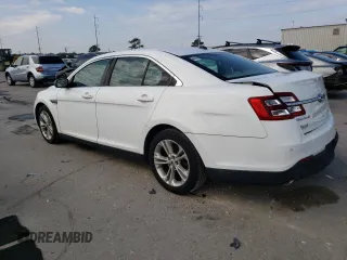 2015 Ford Taurus SEL with VIN 1FAHP2E9XFG175475, listed as a Copart auction lot 82369004 with 150,708 mi miles and Salvage title. Bid and sale history available at DreamBid. Image 2.