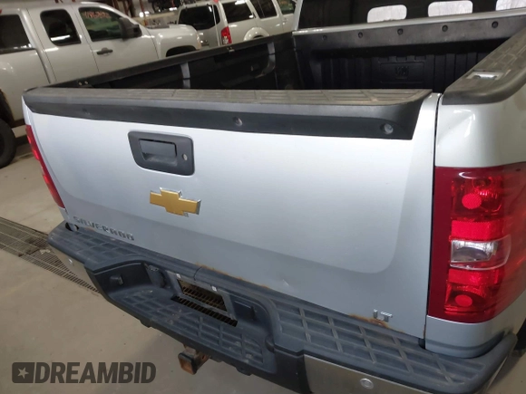 2013 Chevrolet Silverado 1500 LT with VIN 1GCRKSE73DZ328002, listed as a IAAI auction lot 41842745 with 124,496 mi miles and . Bid and sale history available at DreamBid. Image 16.