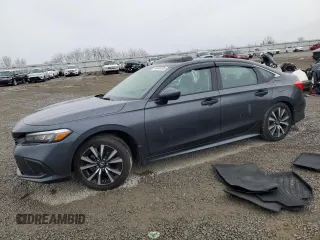 2024 Honda Civic EX z VIN 2HGFE1F79RH336732, wystawiony jako Copart lot #43025295 z przebiegiem 5 468 mil mil oraz Szkoda całkowita • Salvage title. Historia ofert i sprzedaży dostępna na DreamBid. Obrazek 1.