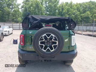 2024 Ford Bronco Outer Banks z VIN 1FMEE8BPXRLA06492, wystawiony jako IAAI lot #42365356 z przebiegiem 17 565 mil mil oraz . Historia ofert i sprzedaży dostępna na DreamBid. Obrazek 16.