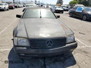 1992 Mercedes-Benz 500 z VIN WDBFA66E9NF050217, wystawiony jako Copart lot #58065965 z przebiegiem 143 456 mil mil oraz Tytuł czysty. Historia ofert i sprzedaży dostępna na DreamBid. Obrazek 5.