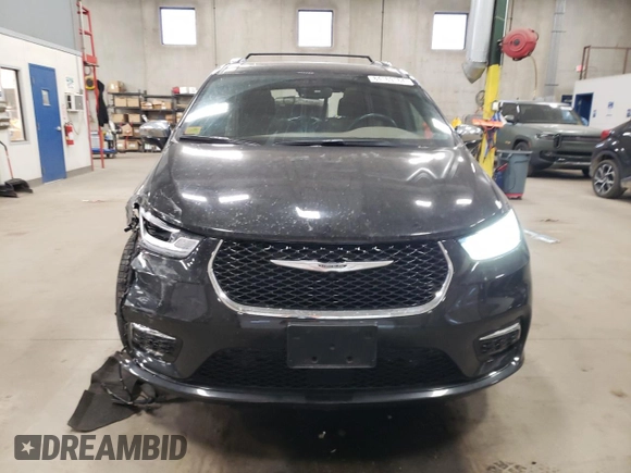 2021 Chrysler Pacifica Limited z VIN 2C4RC3GG1MR595214, wystawiony jako Copart lot #84169164 z przebiegiem 30 737 mil mil oraz Szkoda całkowita • Salvage title. Historia ofert i sprzedaży dostępna na DreamBid. Obrazek 5.