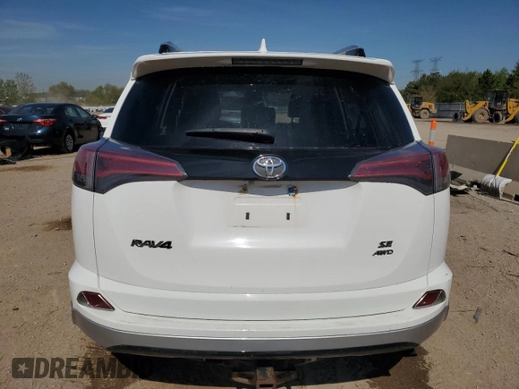 2016 Toyota RAV4 SE with VIN JTMJFREV3GJ054196, listed as a Copart auction lot 56556805 with 130,104 mi miles and Salvage title. Bid and sale history available at DreamBid. Image 6.