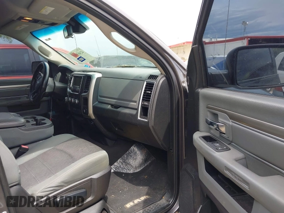 2015 Ram 1500 SLT z VIN 1C6RR6GT7FS742111, wystawiony jako IAAI lot #42469927 z przebiegiem 111 130 mil mil oraz . Historia ofert i sprzedaży dostępna na DreamBid. Obrazek 5.