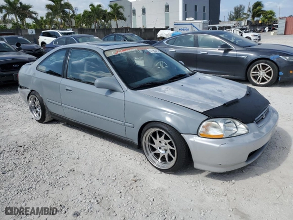 1997 Honda Civic EX with VIN 1HGEJ8143VL043998, listed as a Copart auction lot 51795345 with 129,631 mi miles and Non Repairable. Bid and sale history available at carsss.com. Image 4.